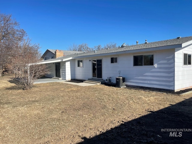 back of property with a patio and cooling unit