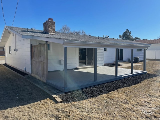 back of house with cooling unit