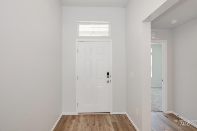 entrance foyer featuring light hardwood / wood-style flooring