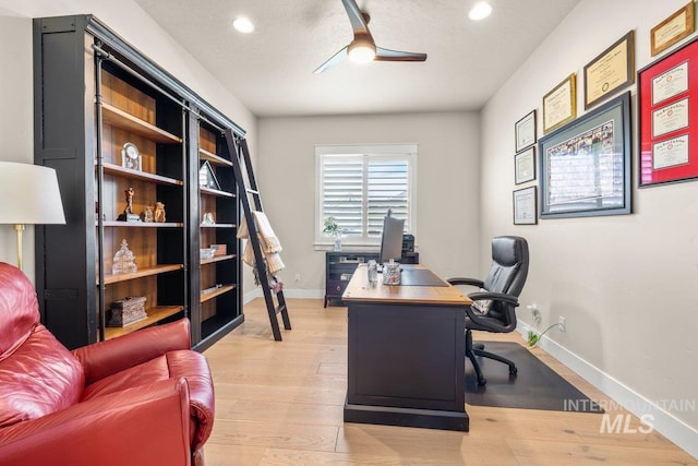 office area with recessed lighting, light wood-style flooring, baseboards, and ceiling fan