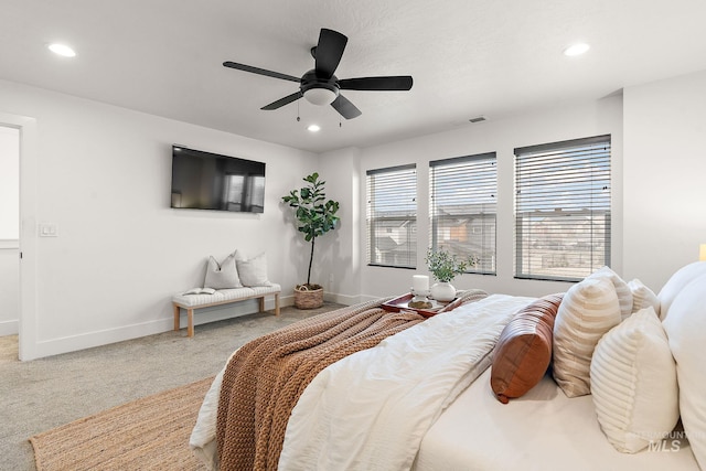 carpeted bedroom with ceiling fan