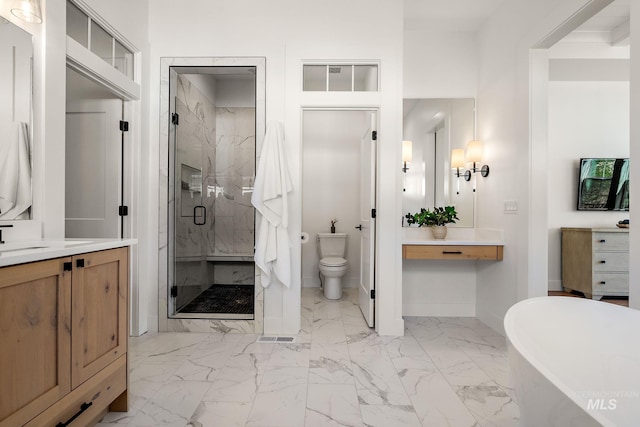 6635 Big Wood Way, Star, ID 83669 - bathroom with vanity, a stall shower, marble look tile flooring, a soaking tub, and baseboards