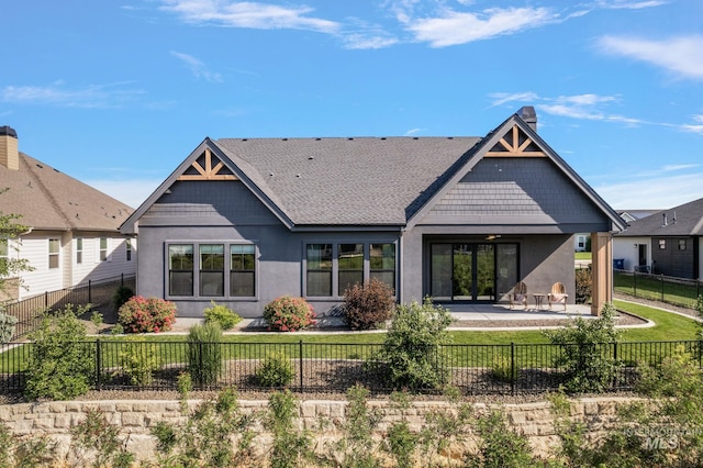 6635 Big Wood Way, Star, ID 83669 - back of property with a patio, stucco siding, ceiling fan, and a shingled roof