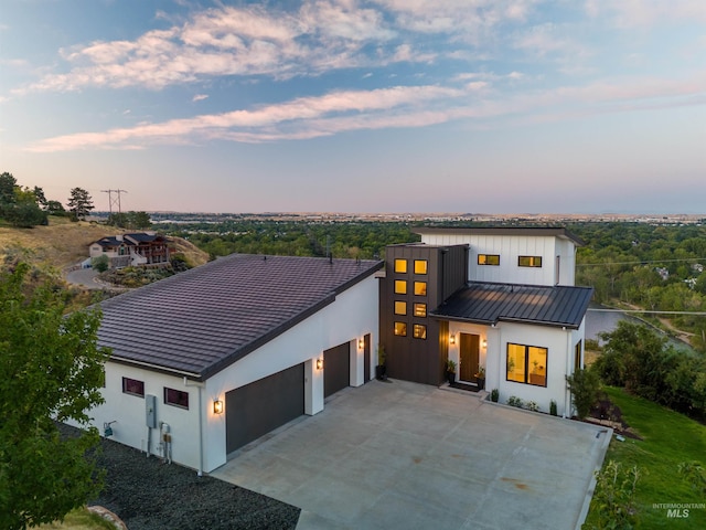 view of front of property with a garage