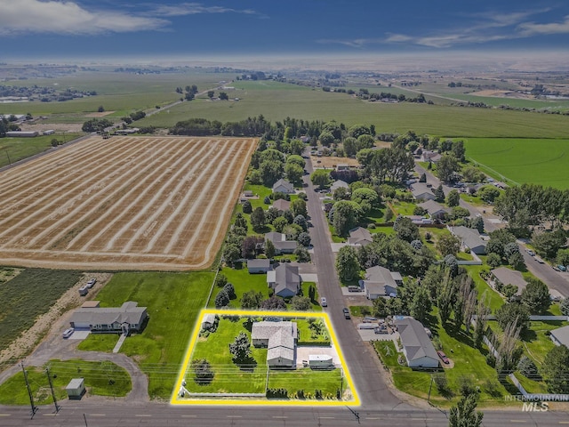 birds eye view of property featuring a residential view and a rural view