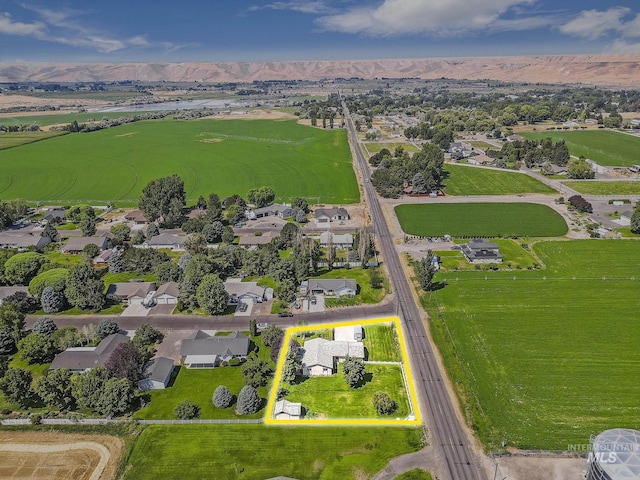 birds eye view of property featuring a residential view and a mountain view