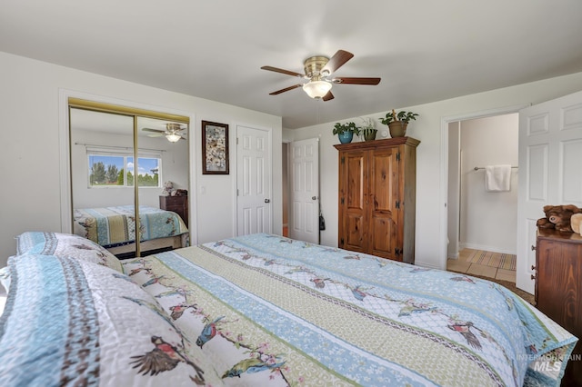 bedroom with a ceiling fan and baseboards