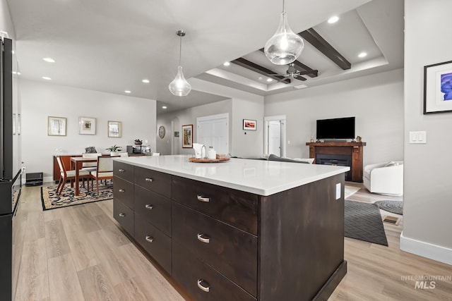 kitchen with light countertops, recessed lighting, and light wood-type flooring