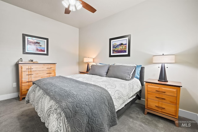 bedroom with baseboards, a ceiling fan, and carpet
