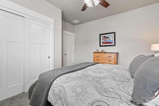 bedroom featuring a ceiling fan, a closet, and visible vents