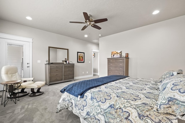 bedroom with baseboards, recessed lighting, and carpet
