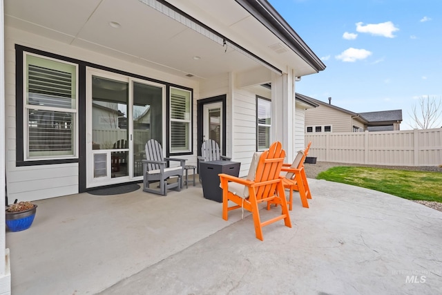 view of patio with fence