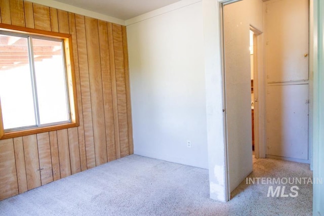 402 S Hayes, Emmett, ID 83617 - carpeted empty room featuring wood walls