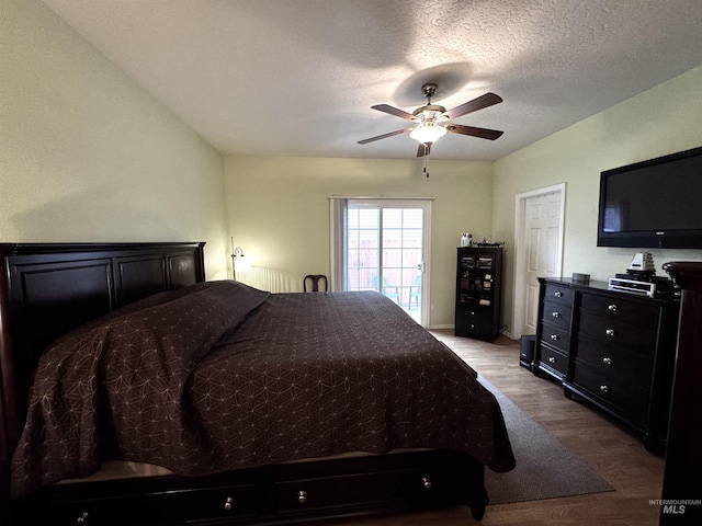 3485 N Chatterton Ave, Boise, ID 83713 - bedroom with light wood-type flooring, ceiling fan, and a textured ceiling