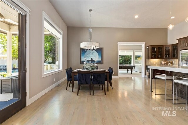 4307 W Briar Rock Ct, Eagle, ID 83616 - dining room with light wood-style floors, a chandelier, healthy amount of natural light, and recessed lighting