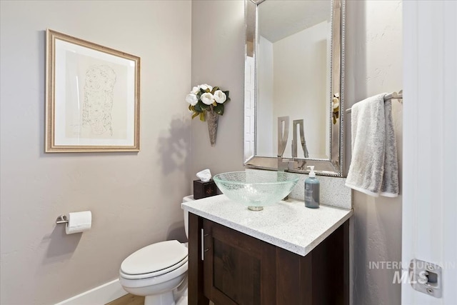 4307 W Briar Rock Ct, Eagle, ID 83616 - half bath featuring toilet, vanity, and baseboards