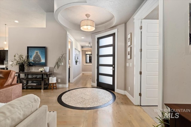 4307 W Briar Rock Ct, Eagle, ID 83616 - foyer with light wood-type flooring and baseboards