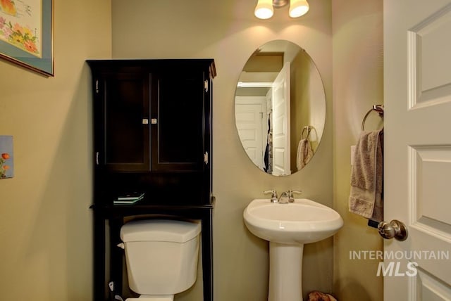 half bathroom with toilet