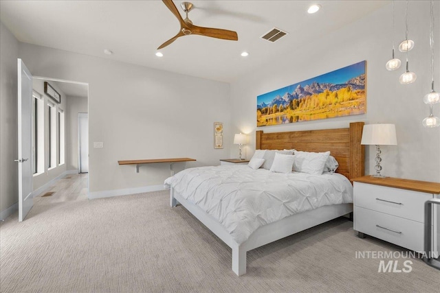 carpeted bedroom with ceiling fan