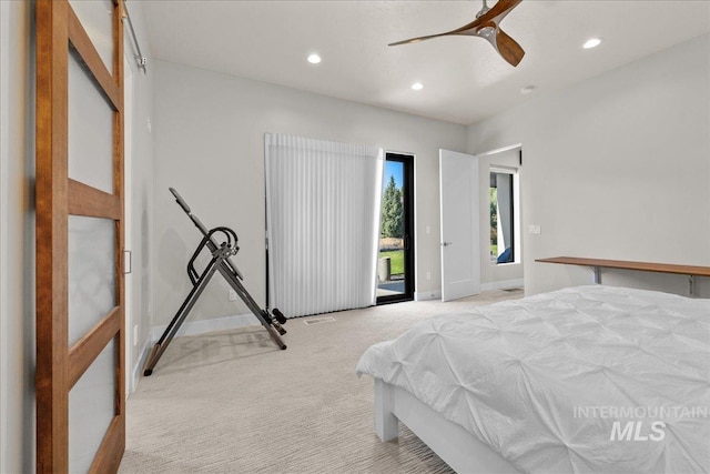 carpeted bedroom featuring ceiling fan and access to outside