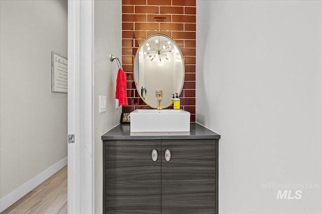 room details featuring wood-type flooring and sink