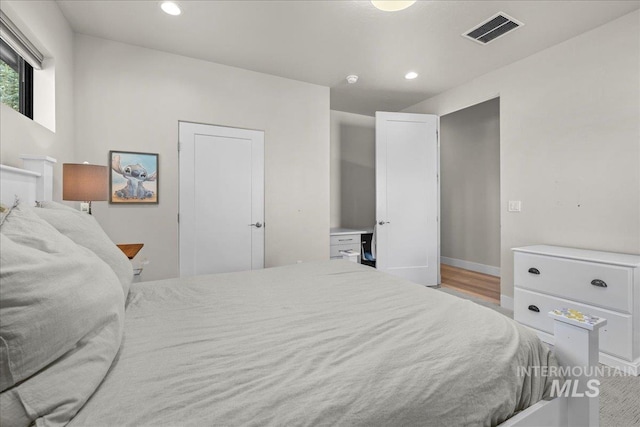 bedroom featuring light hardwood / wood-style flooring