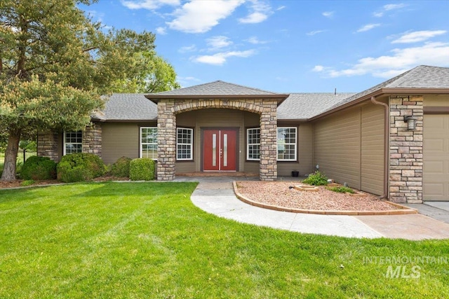 25022 Tumbleweed, Middleton, ID 83644 - ranch-style home with stone siding, a shingled roof, a front lawn, and an attached garage