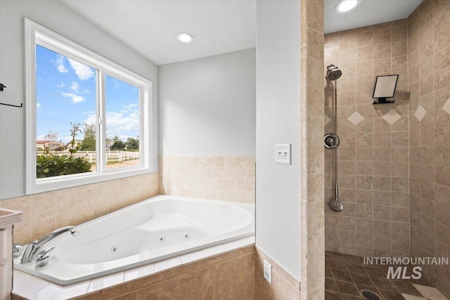 25022 Tumbleweed, Middleton, ID 83644 - bathroom with a tub with jets, a tile shower, and recessed lighting