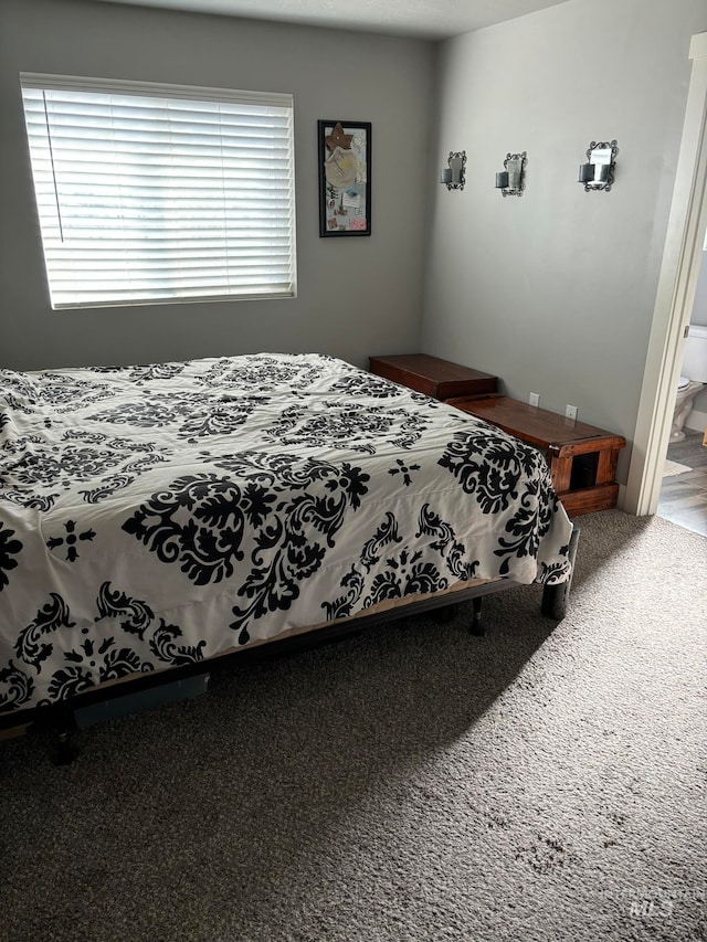 bedroom featuring carpet flooring