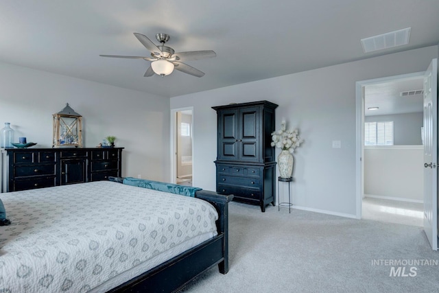 bedroom with baseboards, ceiling fan, visible vents, and carpet