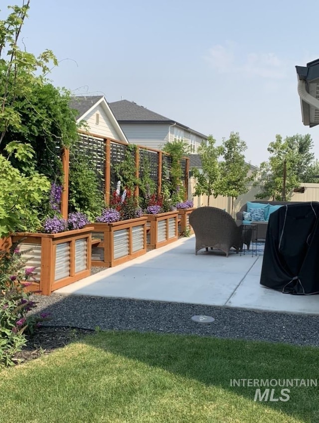 view of patio / terrace with fence