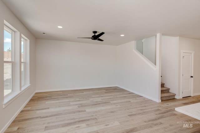 empty room featuring light hardwood / wood-style floors and ceiling fan