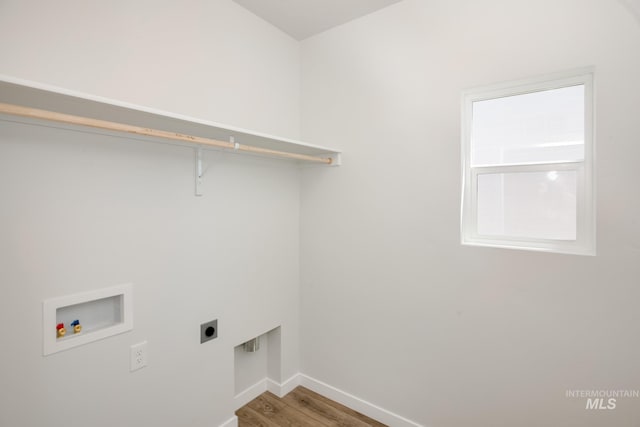 laundry room featuring hookup for a washing machine, wood-type flooring, and hookup for an electric dryer