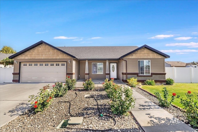 1128 W Wirsching Ave, Twin Falls, ID 83301 - ranch-style house with a garage, concrete driveway, and covered porch