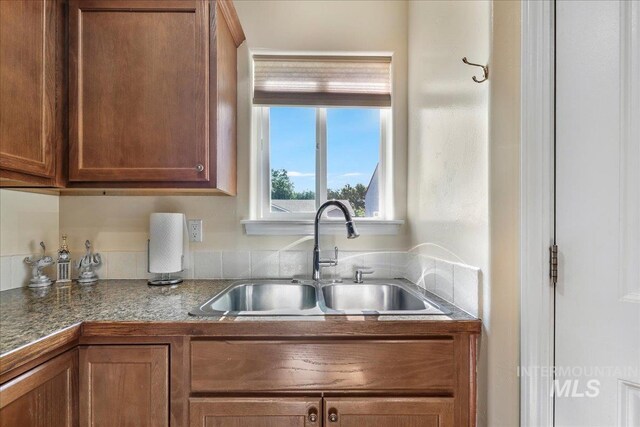 1128 W Wirsching Ave, Twin Falls, ID 83301 - kitchen with a sink and brown cabinets