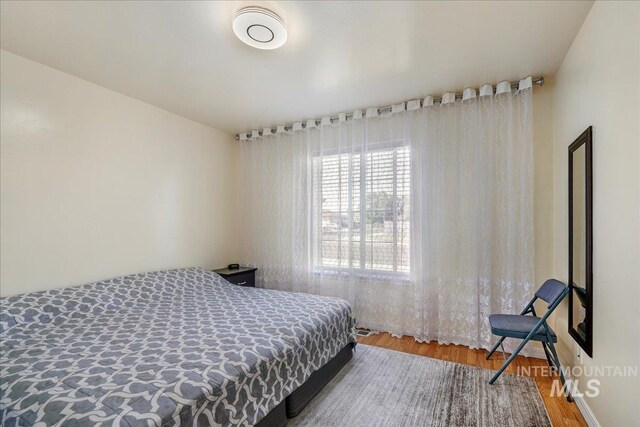 1128 W Wirsching Ave, Twin Falls, ID 83301 - bedroom featuring wood finished floors