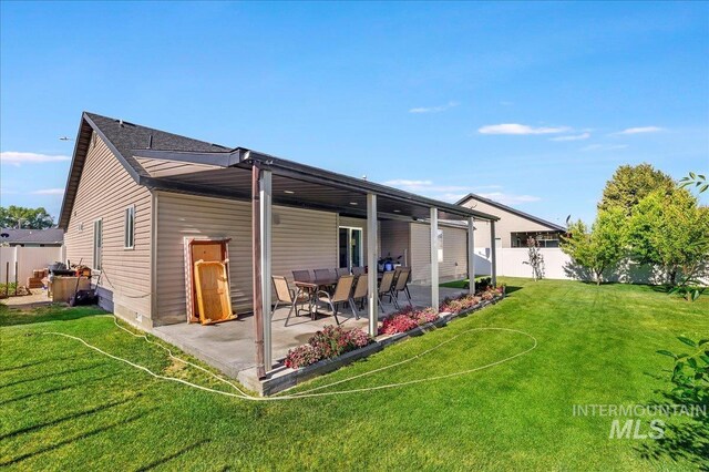 1128 W Wirsching Ave, Twin Falls, ID 83301 - back of property with a patio area