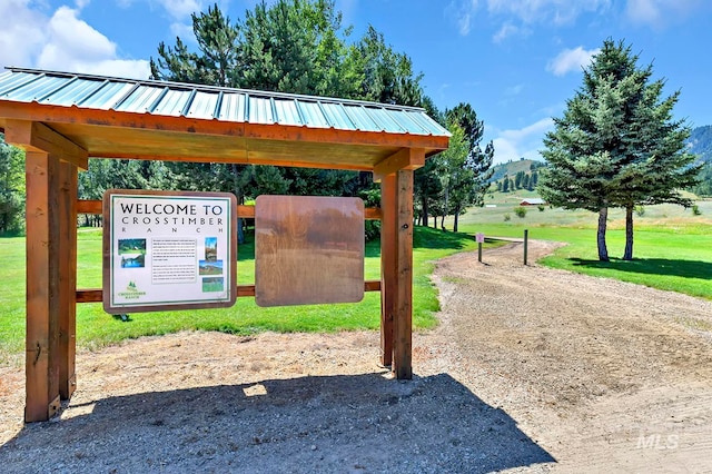 view of community with a lawn