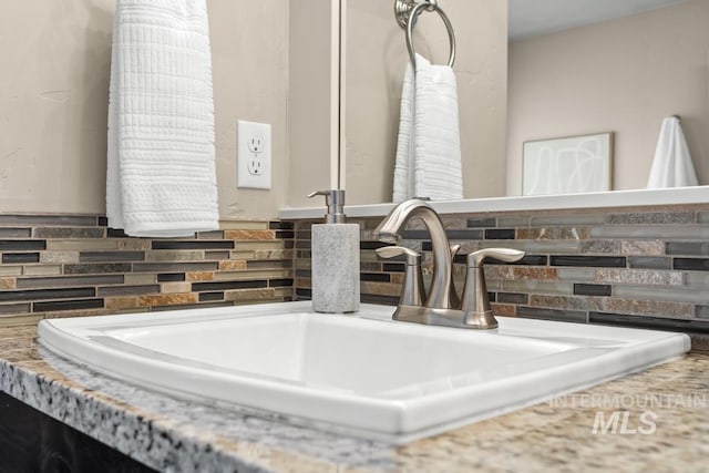 room details with backsplash and sink