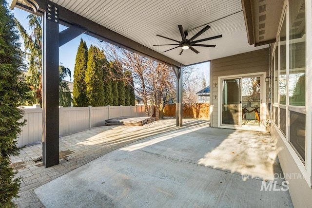 view of patio featuring ceiling fan