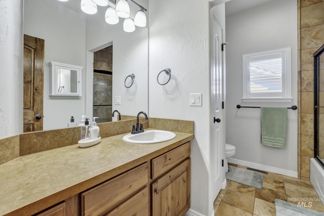 full bathroom with combined bath / shower with glass door, baseboards, toilet, and vanity