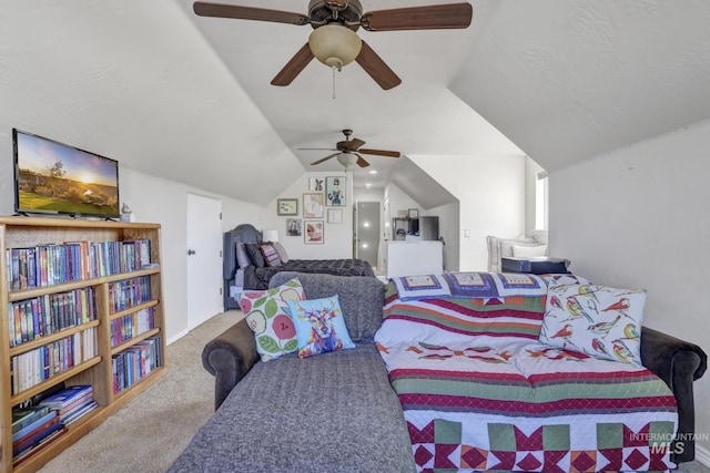 bedroom featuring vaulted ceiling, a ceiling fan, and carpet floors