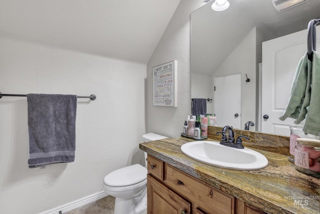 bathroom featuring tile patterned floors, visible vents, toilet, vanity, and vaulted ceiling