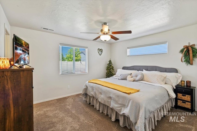 5416 Junegrass Way, Caldwell, ID 83607 - bedroom featuring carpet flooring, baseboards, and a ceiling fan