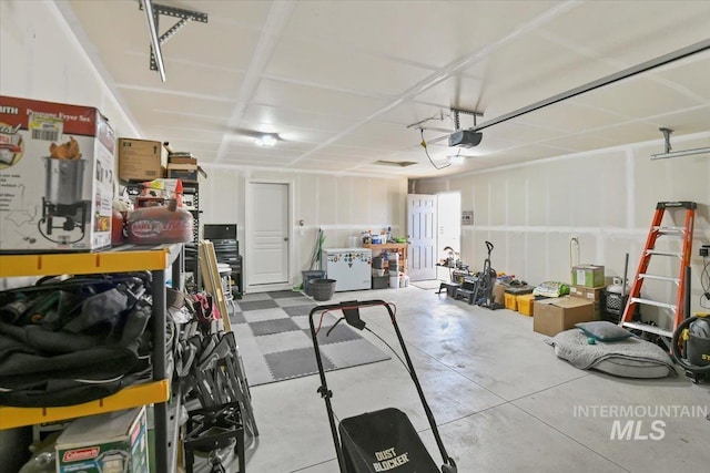 5416 Junegrass Way, Caldwell, ID 83607 - garage featuring a garage door opener