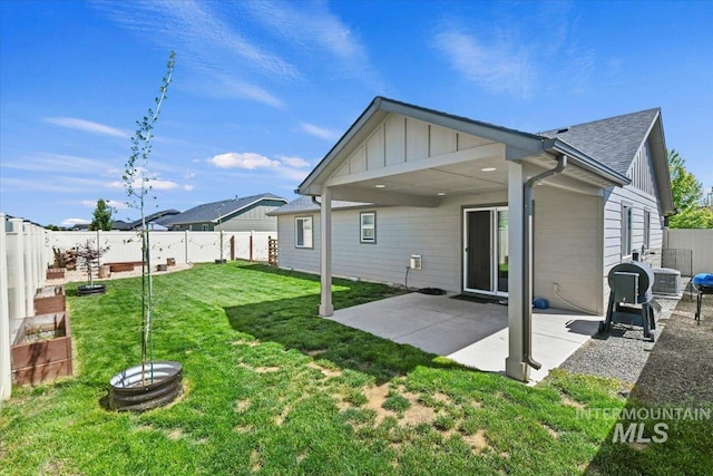 5416 Junegrass Way, Caldwell, ID 83607 - rear view of house featuring board and batten siding, a patio, and cooling unit