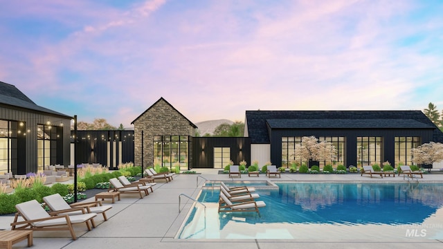 community pool with a patio