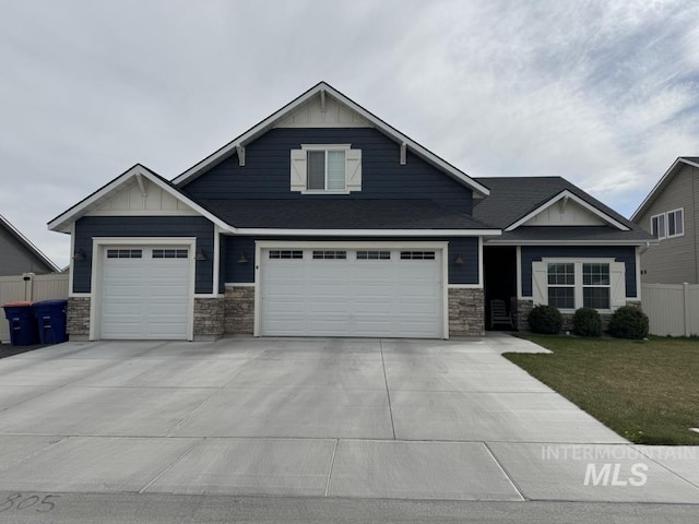 805 Drayton Ave, Twin Falls, ID 83301 - craftsman-style house with board and batten siding, stone siding, concrete driveway, and roof with shingles