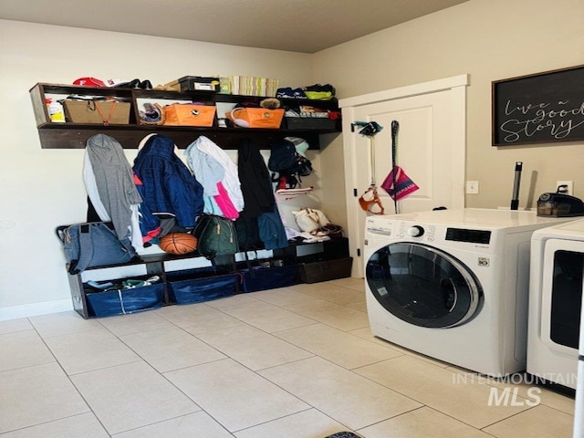 805 Drayton Ave, Twin Falls, ID 83301 - washroom featuring washer and dryer and light tile patterned flooring