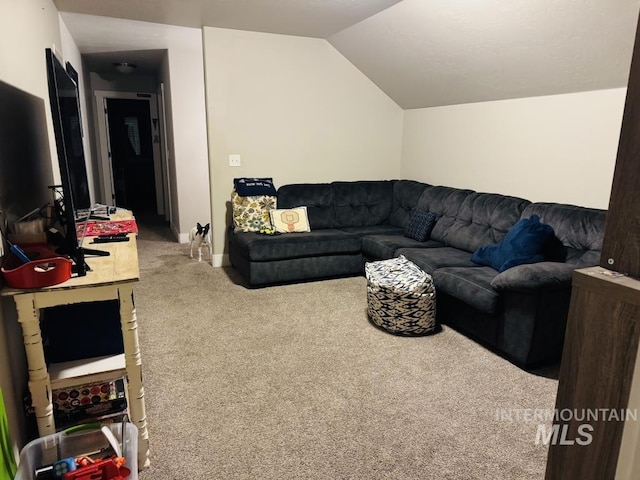 805 Drayton Ave, Twin Falls, ID 83301 - carpeted living area with vaulted ceiling and baseboards